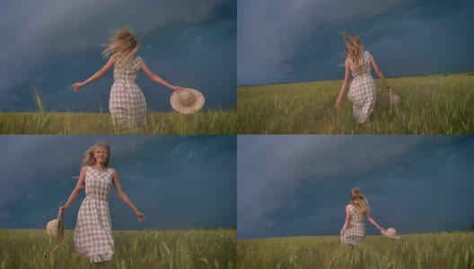 年轻美丽灵感女孩的剪影是在雨天的田野里奔跑，自由的概念高清在线视频素材下载