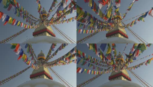 在日出的灯光下，博达哈纳塔的经幡旗。加德满都,尼泊尔。吊车拍摄，超高清，4K高清在线视频素材下载