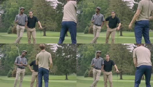 高尔夫球手打一个开球与团体观看高清在线视频素材下载