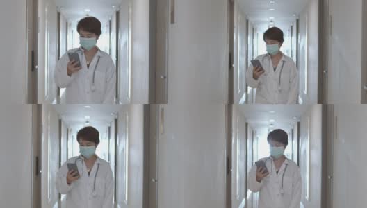 女医生戴着医用口罩用智能手机，慢镜头高清在线视频素材下载