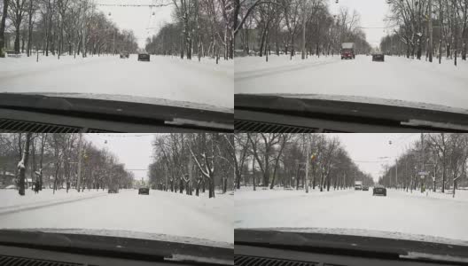 一场大雪过后，汽车载着雪行驶在城市道路上高清在线视频素材下载