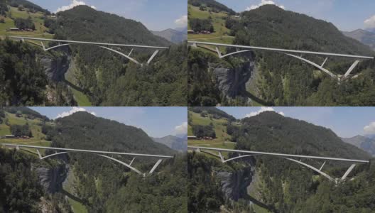 横跨瑞士阿尔卑斯山塔米娜山谷的大桥高清在线视频素材下载