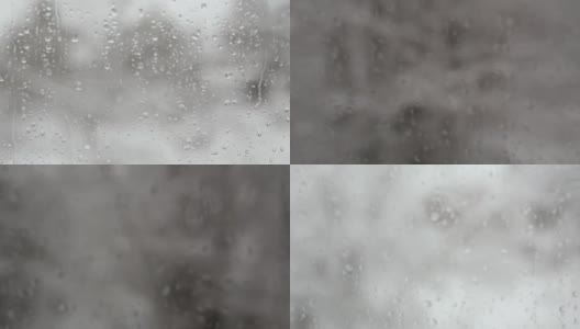 一滴雨落在透明的玻璃上高清在线视频素材下载