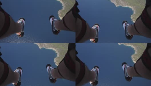 滑翔机的脚，下面是岛屿和海洋高清在线视频素材下载