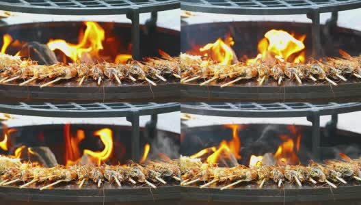 在烤架上煮虎虾(慢镜头)高清在线视频素材下载