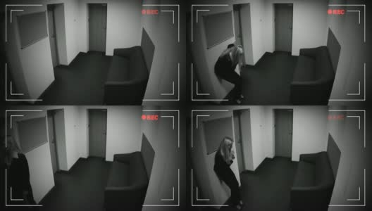 女人在办公室走廊失去意识，中毒，闭路电视摄像头的效果高清在线视频素材下载