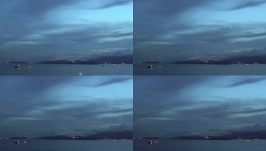 时间推移-深蓝色云景在海上光船黄昏到黑暗10秒高清在线视频素材下载