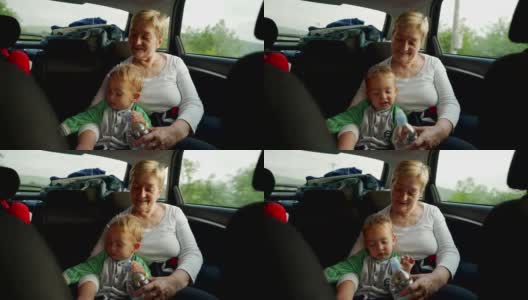 奶奶和孙子在车里高清在线视频素材下载