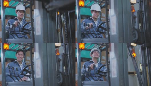 专业亚洲男性工程师控制叉车装载产品托盘与集中在仓库工厂配送基础设施的理念理念高清在线视频素材下载