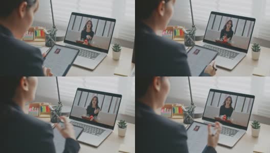 女商人在办公室用笔记本电脑进行视频面试高清在线视频素材下载