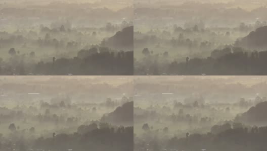 高角度的乡村景色与清晨的阳光和雾高清在线视频素材下载