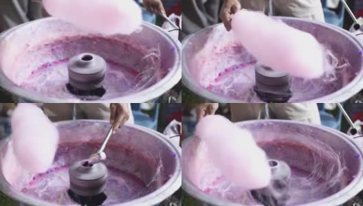 全高清视频制作棉花糖的过程，以糖和粉红色食用色素为主要成分，棉花糖机高清在线视频素材下载