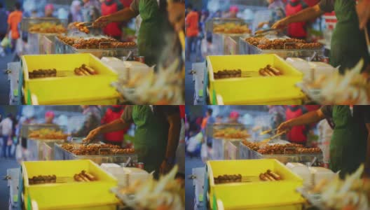慢镜头拍摄马来西亚金马伦高地的金山夜市上的马来西亚街头小吃摊贩高清在线视频素材下载