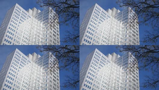 拍摄市中心银色办公大楼高清在线视频素材下载