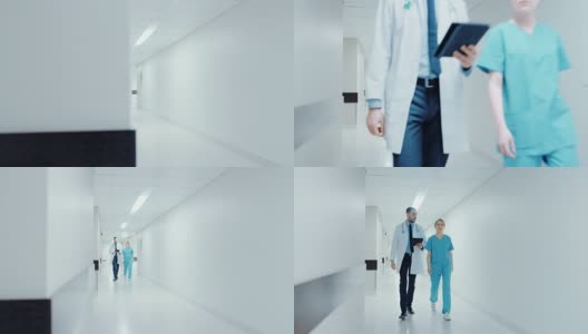 外科医生和女医生一边使用平板电脑一边匆忙地穿过医院走廊，谈论病人的健康。拥有专业人员的现代光明医院。高清在线视频素材下载