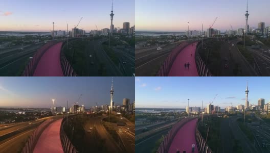 亮粉色的自行车道和奥克兰的天际线高清在线视频素材下载