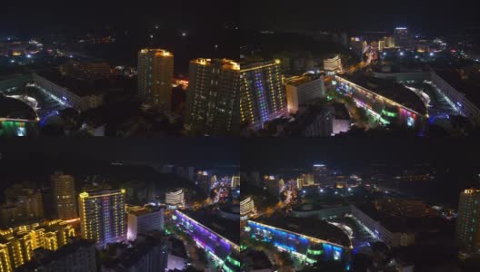 三亚市景酒店屋顶夜景，灯光全景4k中国海南高清在线视频素材下载