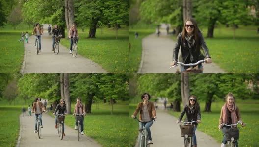 三个活跃的年轻女人在城市公园里一起骑马。带着自行车在户外微笑的黑发女子高清在线视频素材下载