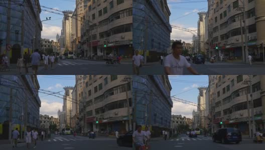 夕阳照亮上海城市交通街道十字路口全景4k中国高清在线视频素材下载