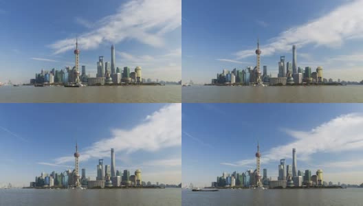 阳光明媚蓝天下的上海城市全景图。陆家嘴金融区和黄浦江。中国高清在线视频素材下载