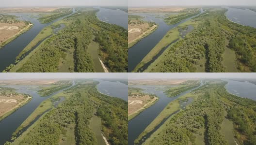 航拍湿地小岛，流入Dnipro盆地在一个阳光明媚的日子高清在线视频素材下载
