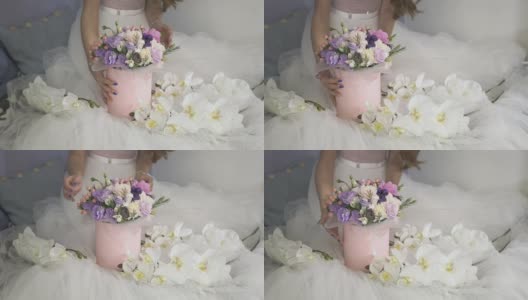 白色连衣裙上缀满鲜花的节日礼盒高清在线视频素材下载