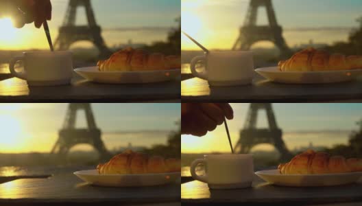 在巴黎，一杯咖啡配一个羊角面包高清在线视频素材下载