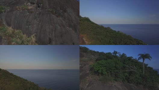 在巴西里约热内卢，攀爬岩面，露出大海高清在线视频素材下载