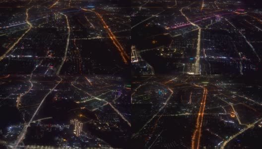 飞过夜晚的城市。俯视图的现代大都市高清在线视频素材下载
