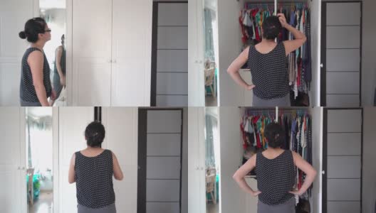亚洲女人打开衣柜和寻找布料的新对齐高清在线视频素材下载