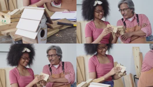 祖父是一名木匠，他的职业是指导儿童和青少年如何为非洲裔美国人的儿童和青少年制作木制玩具。节日活动。高清在线视频素材下载