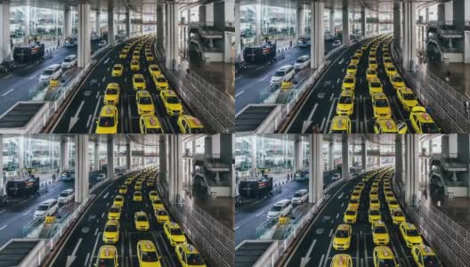 T/L ZI繁忙的黄色出租车在机场出口排队高清在线视频素材下载