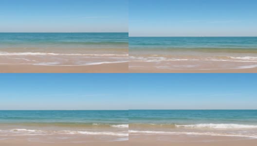 在印度古吉拉特邦Shivrajpur的蓝色旗帜海滩。海浪拍打着海滩的海岸。假期放松的概念。在海滩放松。夏天旅游的背景。高清在线视频素材下载