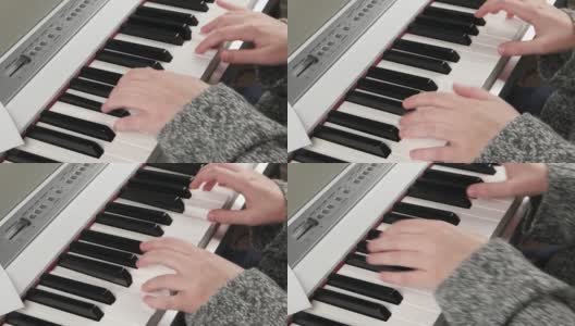 弹机电钢琴，弹钢琴的女孩。高清在线视频素材下载