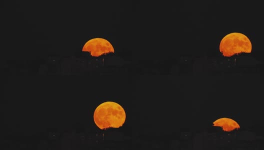 傍晚天空满是丰收，猎人通过长焦距望远镜拍摄大月亮。高清在线视频素材下载