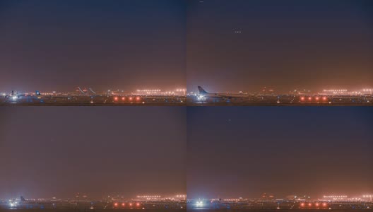 间隔拍摄。北京首都国际机场夜间起飞的飞机高清在线视频素材下载