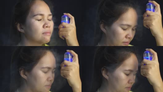 亚洲妇女使用喷雾机进行面部护理。高清在线视频素材下载