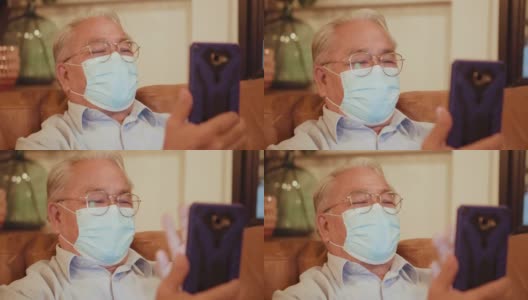 老人用智能手机对医生进行视频咨询。高清在线视频素材下载