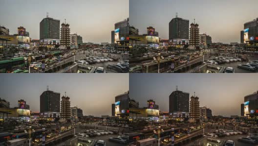 中国郑州——2018年3月25日:从黄昏到夜晚，郑州二七广场与交通高清在线视频素材下载