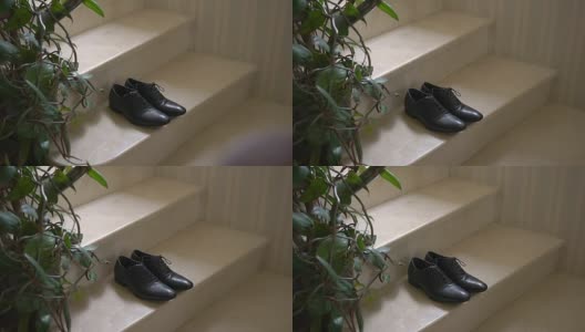A Pair of Formal Men's Leather Shoes on a Stairs高清在线视频素材下载