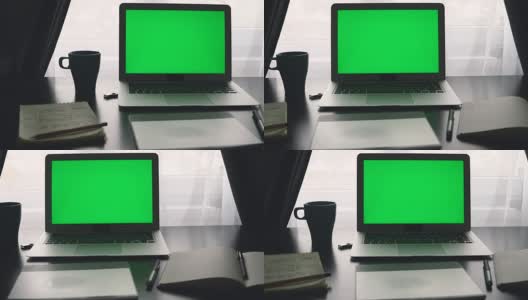绿屏笔记本电脑。程序员的工作高清在线视频素材下载