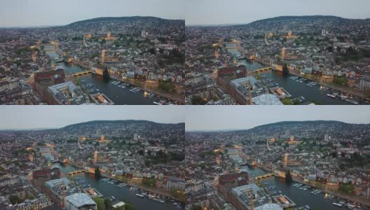瑞士黄昏照亮苏黎世河城市景观空中全景4k高清在线视频素材下载