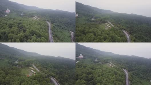 鸟瞰图的森林景观冠层和在越南的道路高清在线视频素材下载