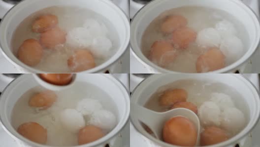 鸡蛋放入锅中沸水中高清在线视频素材下载
