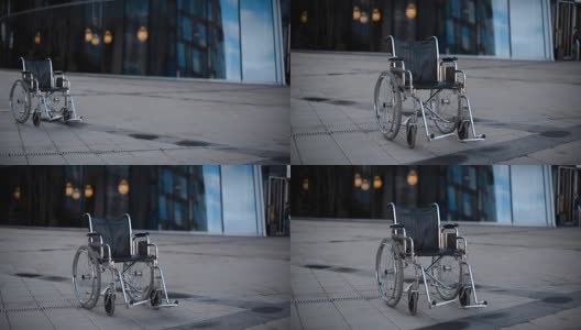 轮椅在现代建筑附近滚动高清在线视频素材下载