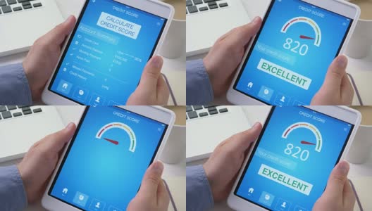 在电子平板电脑上查看良好的信用评分高清在线视频素材下载