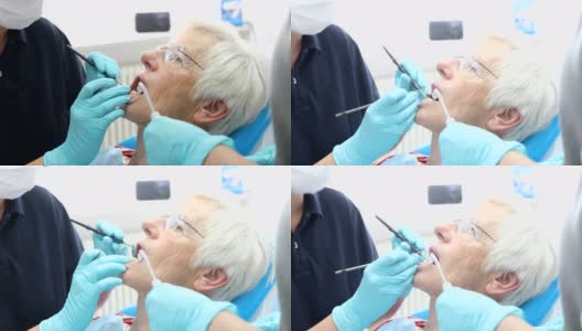 年长的妇女正在牙医那里检查牙齿高清在线视频素材下载