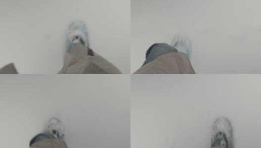 POV雪鞋男往下看冬天的雪冷高清在线视频素材下载