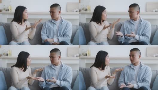 坐在沙发上吵架的亚洲夫妇高清在线视频素材下载