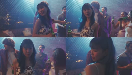 亚洲年轻女子在家里或酒吧的晚会上跳舞。高清在线视频素材下载